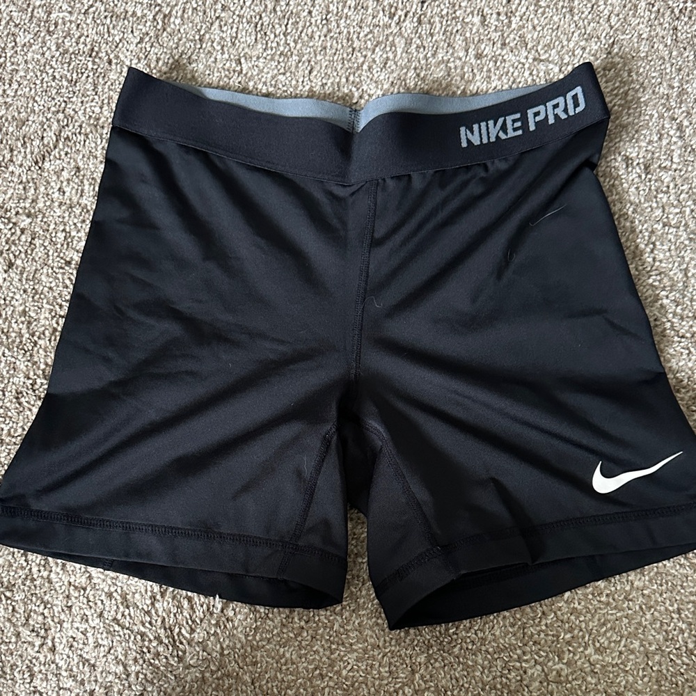 Nike Black Athletic Compression Shorts with White Swoosh